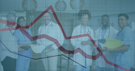 Poster - Medical team standing in hospital corridor, holding clipboards and showing falling financial graph