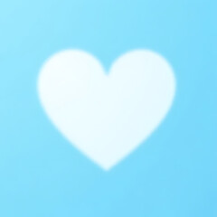 Poster - Soft white heart shape on a light blue background with blurred edges symbolizing love and affection for Valentine's Day