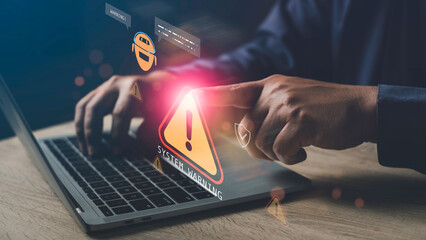 ai system detecting abnormal behavior on laptop, showing warning alert symbol on screen, concept of 