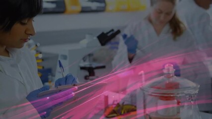 Poster - Blonde scientist lifting micropipette causing neon streaks at lab bench while colleague noting data
