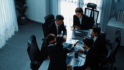 Poster - Top view businesspeople placed tablet at table and planning strategy while diverse team discuss about financial plan. Group of diverse team brainstorm marketing idea at meeting table. Directorate.