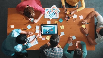 Poster - Top view of skilled business people working together to design web design. Aerial view of designer brainstorming and discussing about website interface for computer or digital application. Symposium.