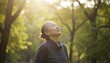 © miss irine - Elderly Asian woman enjoys a peaceful walk in park enhancing mental health. Outdoor therapy promotes relaxation and healing. Sunlit trees create serene atmosphere for wellness.
