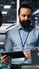 Aufkleber - Vertical video Happy data center colleagues collaborating on neural network software development. Cheerful teamworking server hub coworkers implementing machine learning technology in workplace