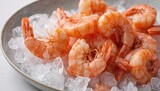 Fresh raw shrimp artistically arranged on crushed ice. Vibrant orange crustaceans offer delicious visual for seafood culinary presentations, gourmet dining experiences. Perfect for food blogs