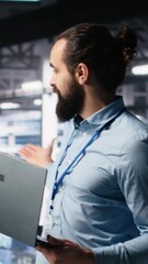 Poster - Vertical video Data center manager presents AI technology to shareholders, demonstrating predictive maintenance capabilities. Man briefing investors on server hub artificial intelligence
