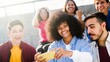 © Vane Nunes - Diverse group of friends sitting in urban park using mobile phone together at sunset, multiracial happy moment