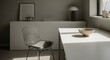 © ikhwan - Stylish minimal workspace with wire chair, white desk, neutral tones, and sculptural decor.