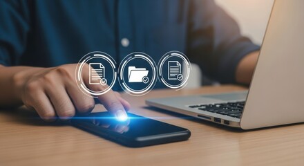Poster - A person using a smartphone with document and folder icons hovering above it next to a laptop