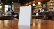 © Yulia - Blank menu holder on wooden table in blurred restaurant with people dining and bar in background