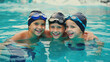 © Audtakorn - Young boys smiling swimming pool water fun happy children friends summer swim school vacation recreation aquatic sports kids leisure healthy active lifestyle