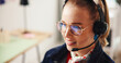 © peopleimages.com - Happy woman, headset and agent with glasses for online communication or advice in home. Female person, consultant or smile in remote work with mic for telecommunications, help or virtual assistance