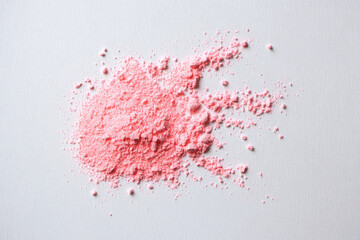 Aufkleber - Light pink powder scattered on matte white surface, fine texture, soft pastel color, artistic and minimalistic, evokes calm and gentle mood