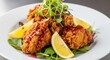 © Jahangir - Crispy Fried Chicken Appetizer with Lemon and Greens