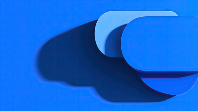 Layered shapes of varying shades of blue.