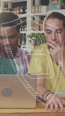 Poster - Animation of padlock icon and light trails over diverse people using laptop