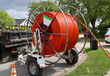 © Robin - Cable drum for laying internet fiber optic cables in residential neighborhood