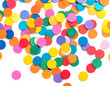 © GePinariya - An energetic explosion of diverse colorful confetti circles spreads joy on a pristine white backdrop.