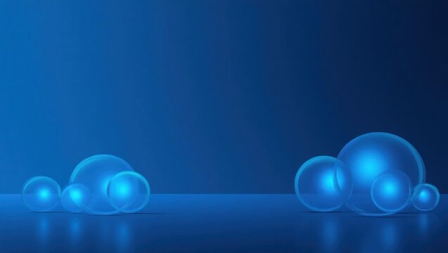Group of translucent blue spheres on a dark blue surface.