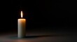 © Eko - Single Illuminated Candle in Darkness Representing Hope and Serenity variation 3