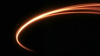 abstract glowing orange and yellow light trails curving across a dark black background