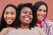 © Sabrina - Happy multiracial young women smiling on camera - Portrait of diverse ethnic girls