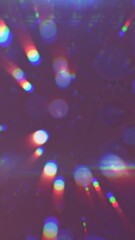 Poster - Soft focus abstract light rays and bokeh circles with rainbow chromatic aberration on a purple background