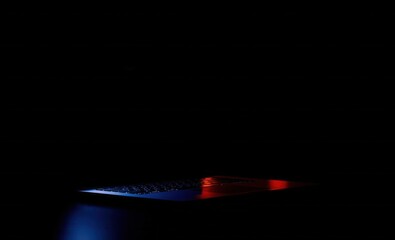 Fototapete - A laptop in the dark from the side Vibrant Rim Light technology vibrant background colorful modern