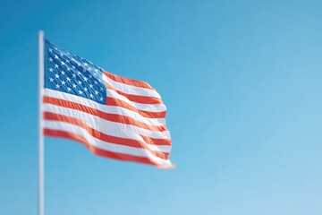 Poster - remembering patriot day with american flag gently waving in breeze against clear blue sky