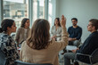 © Masud - Diverse group of people in a circle one raising their hand