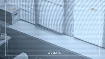 Wall Mural - Security camera footage of two focused office employees typing on computers while working at desks in contemporary workspace