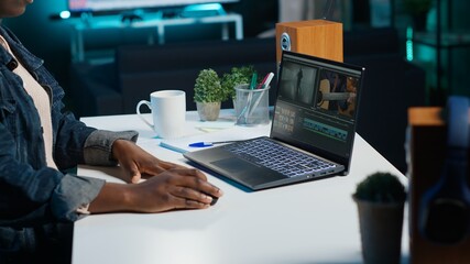 Poster - Professional video editor analyzing film montage before editing color grading and lighting in creative office. Post production studio employee working with raw footage, improving quality, camera A
