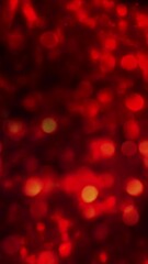 Wall Mural - vertical red lights carousel rainfall 4k loop features defocused glowing lights falling down the scr
