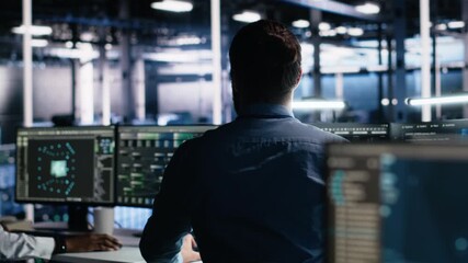 Fototapete - Server room software developer using AI to review infrastructure diagnostics. IT employee in data center analyzing performance data using artificial intelligence technology on devices, camera A