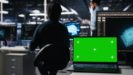 Poster - Close up of isolated screen laptop in data center used by programmer managing AI systems for uptime and efficiency. Admin using artificial intelligence tech on mockup notebook in server hub, camera A