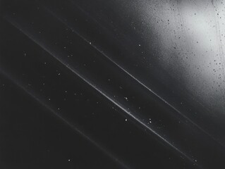 Poster - Abstract dark background with diagonal light streaks and speckles for texture overlay or conceptual design element.