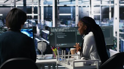 Fototapete - Data center admins doing brainstorming, working on neural network software development. Server farm IT employees working together, implementing machine learning technology using PC, camera A