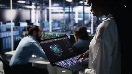 Poster - Close up of data center technician using tablet to monitor neural network AI LLM visualization. Worker using large language model on device to oversee servers powering machine learning, camera A
