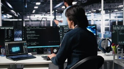 Poster - Admin in high tech data center coding with machine learning generative AI assistant. Worker using artificial intelligence neural networks large language model technology, camera A