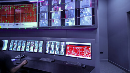 Wall Mural - operators working in a data center system control room offices timelapse hyperlapse.