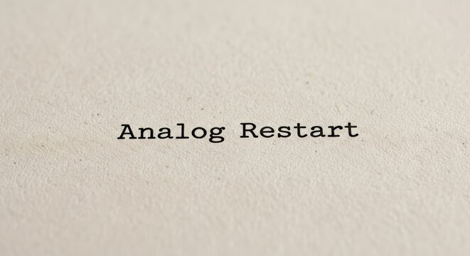 Text 'Analog Restart' typed on textured paper with typewriter font Writing Message Vintage Retro Old Quote Words Communication Information Concept Idea