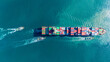 © Yellow Boat - Aerial of cargo ship carrying container for export cargo from cargo yard port to other ocean concept smart freight shipping ship top view