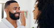 © Wesley25/peopleimages.com - House, cream and couple in bathroom, help and wellness with skincare, dermatology and lotion. Healing cosmetics, sunscreen or man with woman, relationship and healthy skin with support or grooming