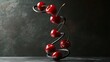 © saima bibi - Twisted stem cherries hovering like a dance pose