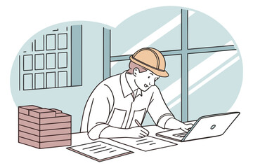 Aufkleber - Construction worker reviewing project plans at a desk with computer and documents during work hours in a commercial office environment