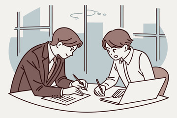 Poster - Business professionals collaborate on project documents while seated at a table in a modern office setting during daylight hours