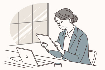Poster - Professional woman using a tablet while sitting at a desk in a bright office with a laptop and a glass of water in the morning