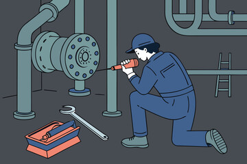 Aufkleber - Plumber working on industrial pipe system with tools in a dark setting during maintenance tasks