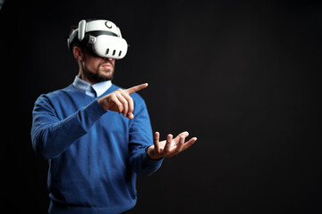 Poster - Virtual reality exploration in a dark space with a man wearing a headset and engaging with a virtual environment in real time