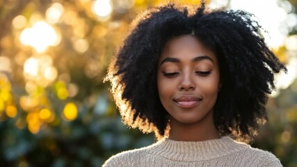 Wall Mural - Peaceful African American woman enjoying serene autumn moment outdoors. Ideal for wellness, mindfulness and seasonal lifestyle content.